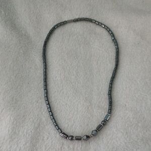 Sleek Silver and Black Necklace with Modern Design